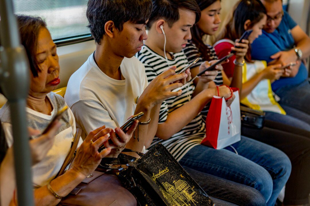 people scrolling on phones